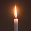 "lit candlestick"